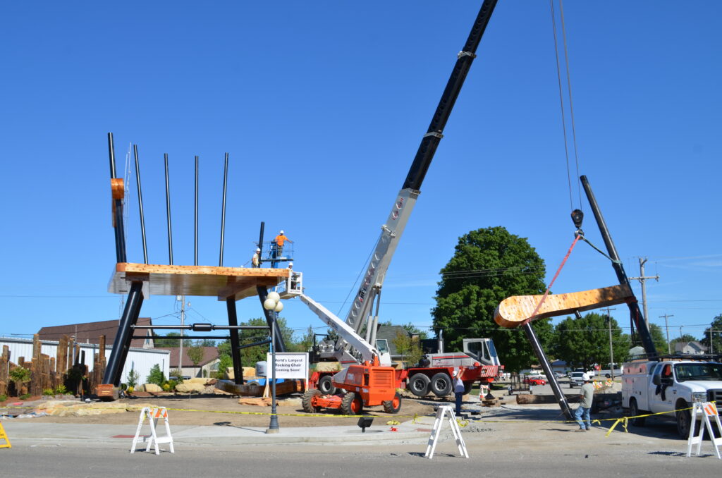 A large, in-progress structure depicting a rocking chait.